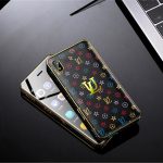 A sleek and compact Ulcool U2 Mini Smartphone with a leather back cover, shown on its edge, highlighting its premium design and portability.
