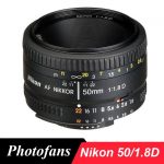 A sleek and compact Nikon 50mm f/1.8D lens sitting atop a DSLR camera, highlighting its lightweight design and versatile capabilities for photography enthusiasts.
