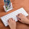 78-key Bluetooth mini keyboard for iOS, Android, and Windows devices with ultra-slim design and multi-OS compatibility.