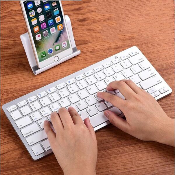 78Keys Mobile Phone Wireless Keyboard Bluetooth Mini Keyboard Tablet Keyboard For iPhone Samsang Andriod IOS Windows 1 Work Anywhere – 78-Key Bluetooth Mini Keyboard for iOS, Android & Windows