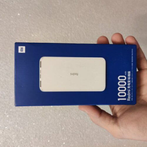 Compact Xiaomi 10000mAh Power Bank with dual USB ports, perfect for charging multiple devices on the go