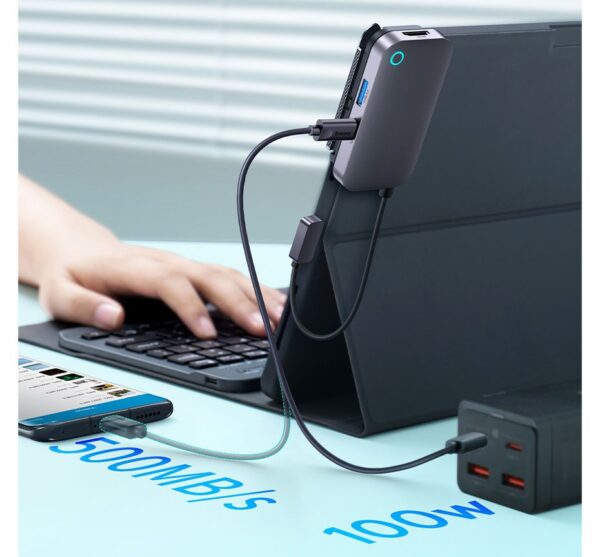 iPad Xiaomi HUB Docking Station3 Compact USB-C Hub attached to an iPad Pro, showcasing multiple connected devices and a 4K external monitor for professional use